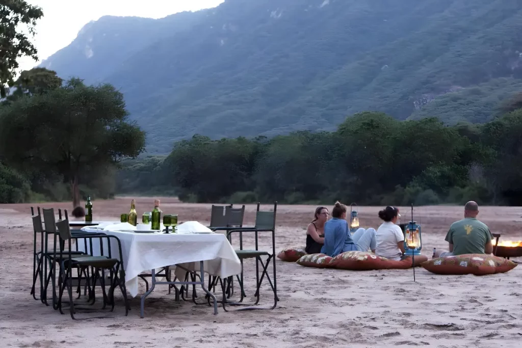Relaxing by the river at Manyara Green Camp after a day game drive | Eco-friendly lodge in Lake Manyara National Park - East Africa Safari Guides