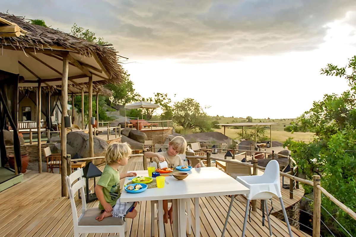 Children enjoying breakfast in the heart of Serengeti wilderness at Nomad Mkombe House